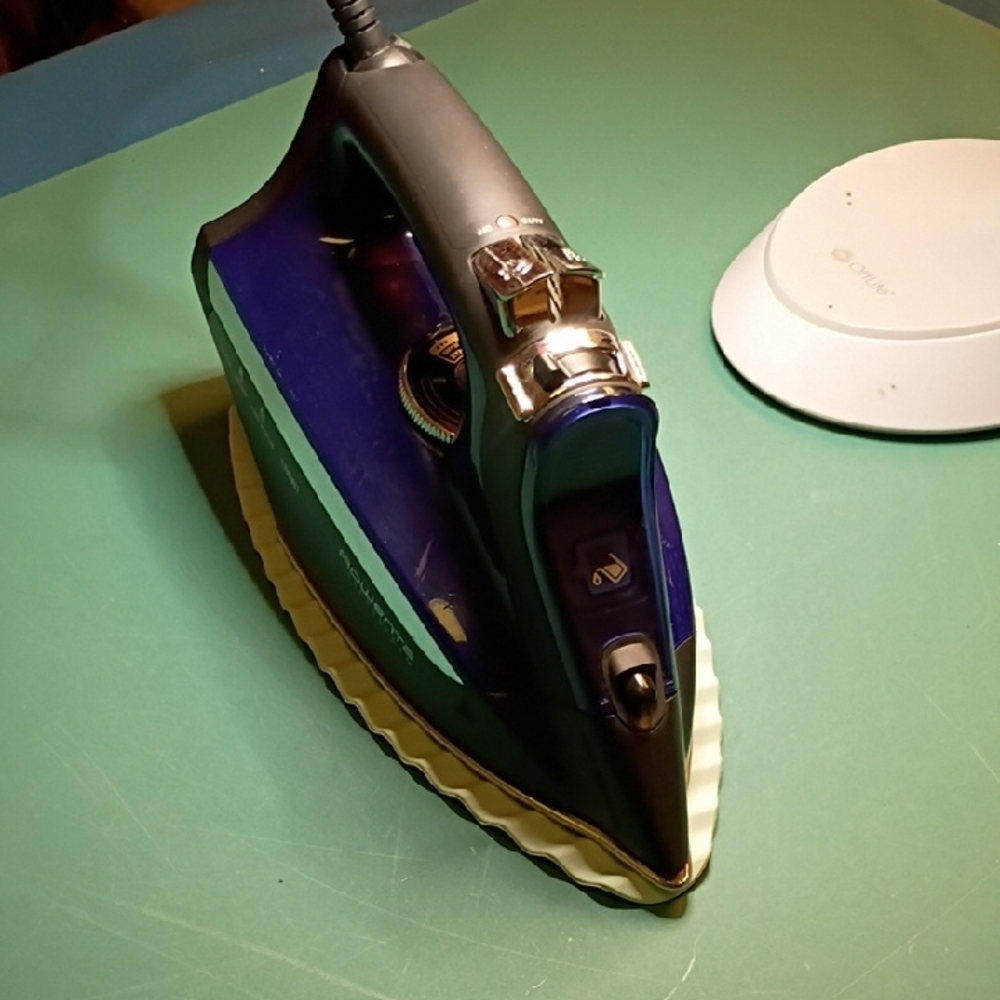 Sleek Blue and Black Steam Iron